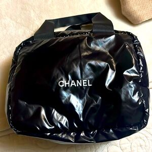 Super cute black puffer chanel handbag/cosmetic carry. Use as either!